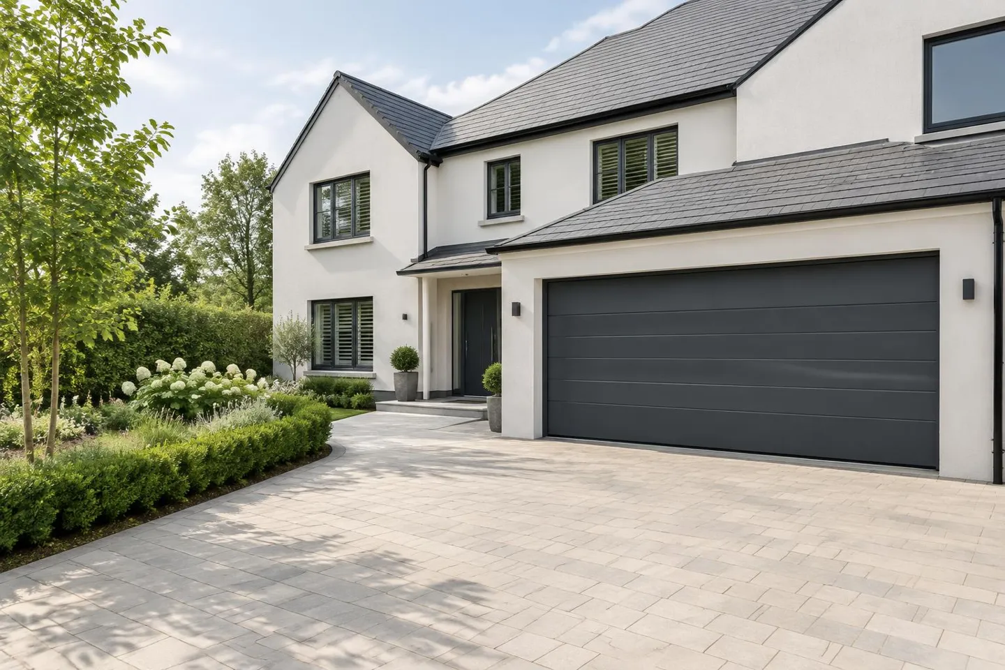 Modern home with an electric sectional garage door